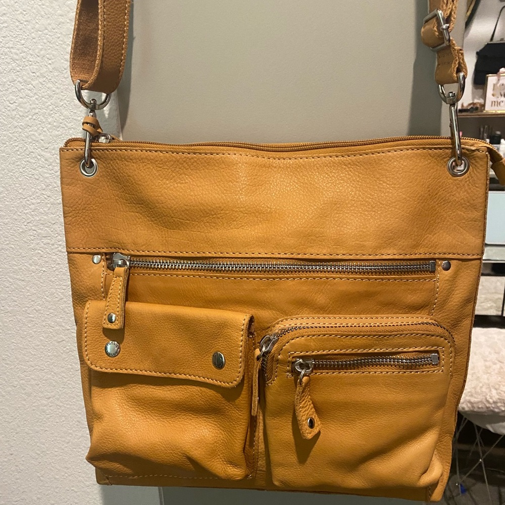 Fossil mustard yellow leather purse.